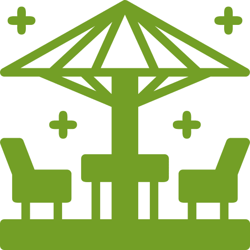 Hardscape & Patio Installation Icon of two chairs and a table under a patio umbrella, with stars around, in green.